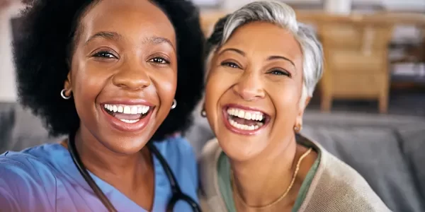Caregiver providing in-home support to a senior